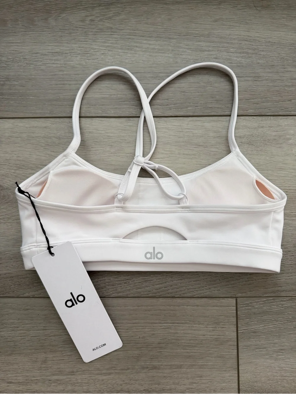 ALO Yoga Airlift Intrigue Bra in White  — Size XS